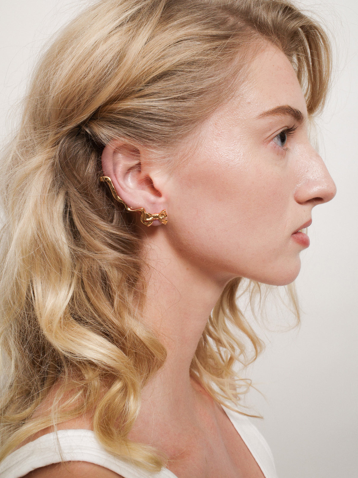 Bow Climber Earrings in Gold