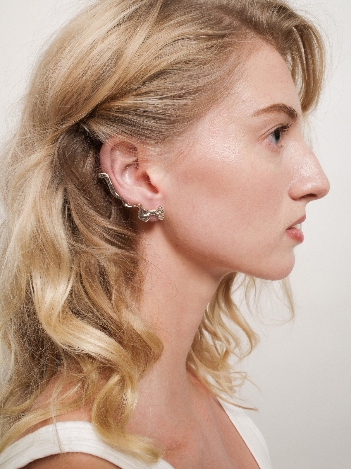 Bow Climber Earrings in Silver